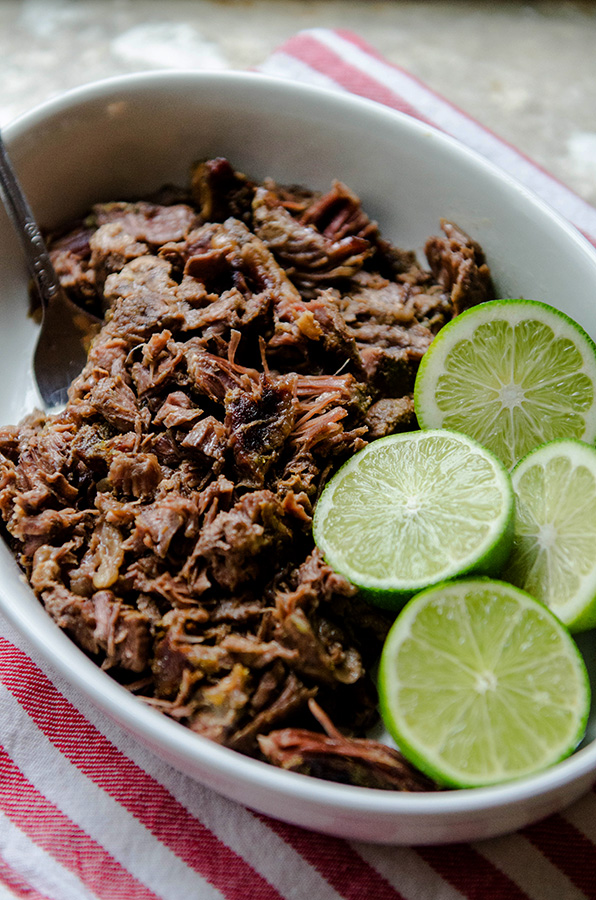 #SlowCooker Margarita Beef by @SoLetsHangOut // This beef is cooked in #tequila and #lime and it's absolutely delicious! #glutenfree #paleo #primal #crockpot #mexican #tacobowl #margarita #shredded #beef 