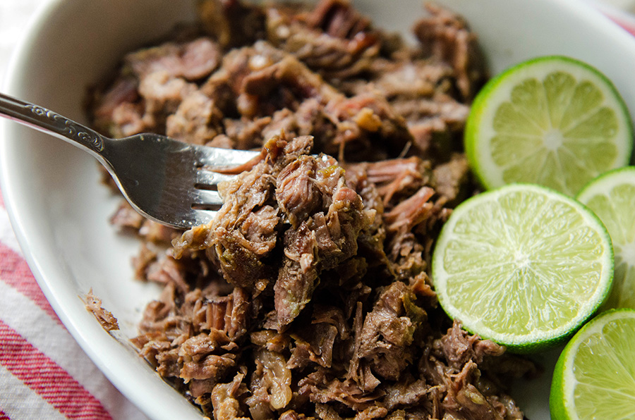 #SlowCooker Margarita Beef by @SoLetsHangOut // This beef is cooked in #tequila and #lime and it's absolutely delicious! #glutenfree #paleo #primal #crockpot #mexican #tacobowl #margarita #shredded #beef 