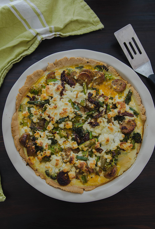 #GrainFree Spring Harvest Quiche with Sausage, Sun Dried Tomatoes & Goat Cheese by @SoLetsHangOut // #glutenfree #primal #quiche #paleo #spring #brunch #easter #breakfast