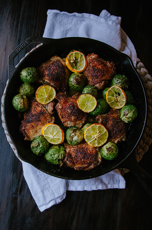 One-Skillet Crispy Lemon Pepper Chicken Thighs and Whole Roasted Brussels Sprouts by @SoLetsHangOut // #paleo #glutenfree #primal #chicken #skillet #onepan #lemonpepper #brusselssprouts 