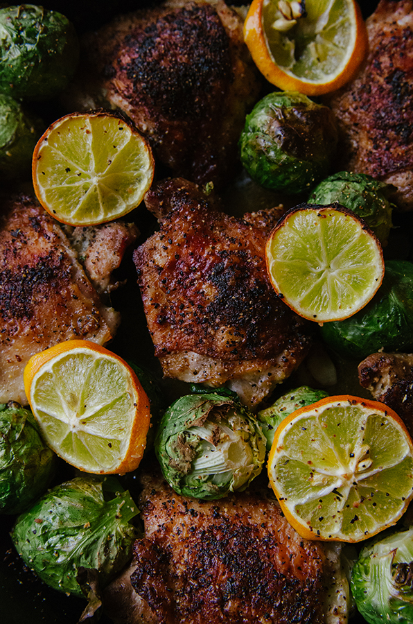 One-Skillet Crispy Lemon Pepper Chicken Thighs and Whole Roasted Brussels Sprouts by @SoLetsHangOut // #paleo #glutenfree #primal #chicken #skillet #onepan #lemonpepper #brusselssprouts 